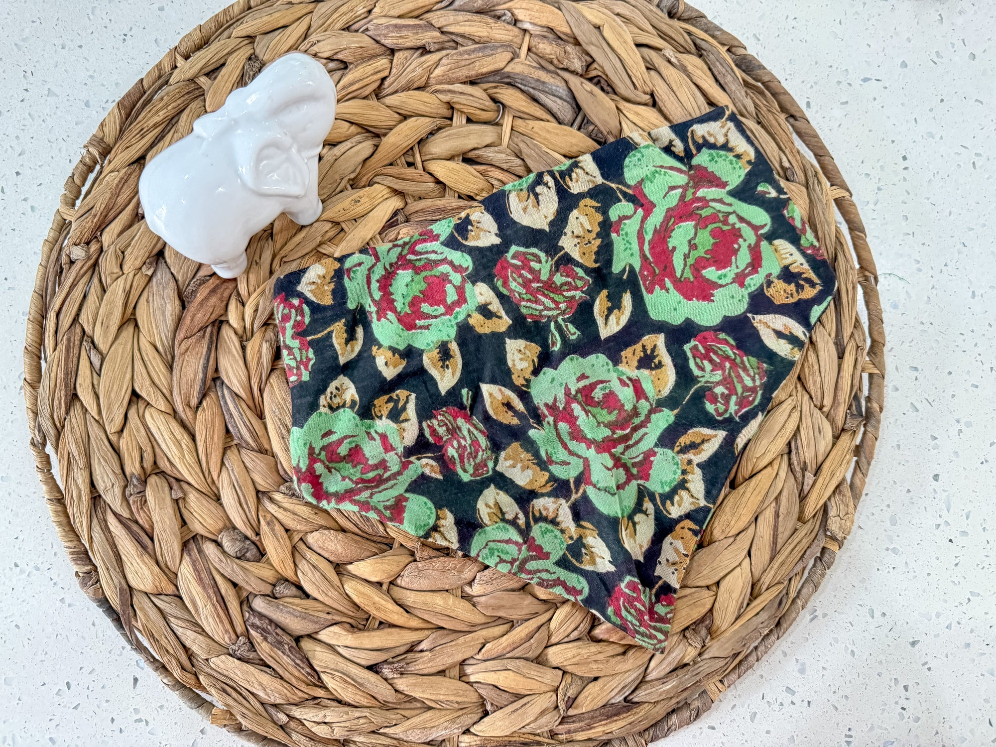 a close up of a basket with a cloth